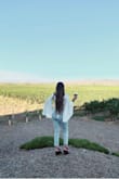 This top is a show-stopper! Super comfy and dressy, wear a low-cut bra with it. I like how flowy the sleeves are and that it zips in the back. This is perfect for a girl's day at the winery or going out on a date! A must-purchase! - Mandi H.