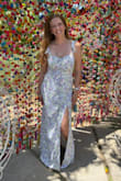 The dress fit so well. Got a ton of compliments when I wore it in Cabo. The breast area has a drawstring so you can accommodate for different sizes. So pretty flowy and fresh! - Andreina J.