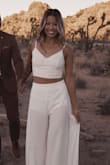 Wore this for my engagement shoot and mixed and matched many times after.. i wore the pants for my bachelorette and the top on my honeymoon > - Angela S.