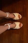 I bought these to wear with a white jumpsuit for my bachelorette party and they are absolutely perfect! I love the platform heel and the sole has a layer of soft padding that makes them so comfy. I was worried about the heel being too tall but they are just right! I am a size 8 in most other shoes and got an 8- they fit perfectly. Absolutely get these!! - Claire W.