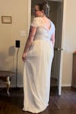 This dress is pretty, but you can't tell it's separates on a short torso. The two pieces just overlap. The large skirt had my waist SNATCHED. This did not feel very bridal, but maybe more of a rehearsal dinner outfit or reception. - Kaetlyn M.