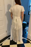 Ordered this dress for my upcoming wedding and I am so pleased with it. I had ordered a few dresses from other sites but this Lulus dress was cheaper, fit better, and seemed to be higher quality. This dress is exactly what I was looking for - super simple, lightweight, and flattering. I did have to get a few alterations - my seamstress is taking in the shoulders for me which will help it fit in the chest. It is low cut but I don't mind. The seamstress is also going to extend the slip to match the full length of the dress - which I think will make it a bit more formal. Also, as a short person, this dress length  fits me perfect as a full-length, not a midi. So keep that in mind if you're ordering. - Kelsey P.