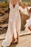 This dress was PERFECT. My husband was blown away when he finally saw the dress. If you're thinking about getting this...GET IT. You can see through the lace but there is a nude bodysuit underneath. - Jamie S.