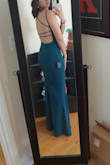 When I first put it on, I was a little worried about how snug it was around the hips, but then remembered it's a mermaid cut. It fits perfectly, I feel great in it, can't wait to wear it for a wedding soon! - Katerina S.
