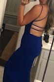 Ultimately returned and wore a different style. The pros: flattering from the front, pretty color, super long. Cons: I don't have back rolls but the straps made it look like I did - ha! It was just a lot lower/revealing in the back than I expected and the straps were just...a lot for me. Returned! - Rachel S.