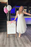 I absolutely loved this for my bridal shower! The skirt was just the right amount of fun/drama and I loved the flutter sleeves. The fabric was so comfortable and I got a ton of compliments. I paired with the lulus shoes with the big bow on the back and felt so bridal. - Katie S.