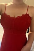 I was a little worried about the lace looking cheap but it's beautiful - a true red. I'm wearing to a wedding in Spain and it's perfectly on theme. My only complaint is that it's a little loose around the stomach, but I'm on the bustier side so it's nothing I'm not used to. - Elizabeth D.