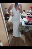 I found out I was pregnant 3.5 months before my wedding. So we bought this as a backup and it is so comfortable and stretchy. I am tall and it's still a little longer if I was wearing heels it would be perfect! - Nicole S.