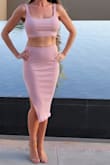 This is a very fitted dress but looked great! I love that it's a two-piece so I could pair the top with a different skirt for a totally different look. - Angela C.