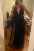 The bust ran a little big and it is long. I really like it, but it almost feels like a nightie because of all the tulle and lace. If you dress it up with nice shoes and jewelry, I think it works. - Ross F.