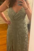This is probably my favorite dress that I own right now. The dress is long, I'm almost 5'10 and wearing 3-inch heels in the photo. The fabric feels so unique and fun. It's a really flattering dress. The only thing is that one of the fabric folds in the bust sticks out a little if not pinned, but that might be because the bust is a little big on me. - Ross F.
