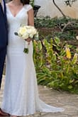 This dress was perfect for my small wedding. Felt very elegant, a little bit sexy, a little bit cute, slightly form fitting but also classic. A beautiful dress that shows off your curves! - Jennifer L.