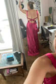 I am going to be a bridesmaid in my friend's wedding, and this is the dress she has us get. The size I got fits me well, and it's a great dress overall, but there is an awkward extra amount of fabric around the stomach. The dress hits my hips at a weird place (it might just be me though, I have a short torso and long legs.) - Miranda S.