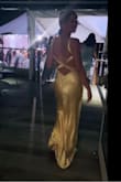 This. Dress. Is. A. Dream!!! I wore this to a summer black tie wedding and received so many compliments! The color, material, fit, and length are spot on and it gives off major Kate Hudson vibes! In the sunlight, the dress is a beautiful golden yellow and in the evening it's looks more champagne yellow. You will not be disappointed!! - Jennifer L.