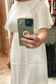 It is tight in the boobs and somewhat tight in the waist, but I'm currently on a diet (lost 17# so far!) and this will give me the incentive to lose more :) I bought it for my 25-year vow renewal I have planned for February 2023. It is such a pretty dress and I'm so glad I found it! - Karen C.
