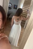 This dress was all that I could have hoped for. We had a charity event to attend and it was so comfortable and easy to wear. The back detail is so detailed and dainty. I can not say enough good stuff about this dress. - Amanda W.