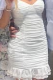 Very cute dress! Great fit. I wore it for my bridal shower and I was comfortable all day! Straps are adjustable. Length was a little short but I still liked it! Great dress. - Winona L.