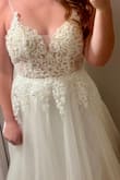 This dress is beautiful! The quality is amazing, and for the price point is unbeatable. The dress runs small in the chest. I did have to size up in order for it to fit. If you have a bigger bust or a wider back this dress might not fit. I am a 32 A and had some trouble zipping it up.
Completely recommend this dress! I'm so excited to wear it to my wedding! - Kristian Z.