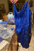 I'm not sure, what happened but I was sent a different dress. It's labeled "peak part vibe" and is a similar blue, but is otherwise completely different. Good news, it fit perfectly! Bad news, it isn't the dress I wanted and isn't formal enough for what I need. Will be returning and hope when I reorder I'm sent the right dress! - Mary