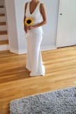 I ordered multiple wedding dresses from Lulus and while I loved every one of them in a different way, there was just something special about this beauty. The dress is made out of a very comfortable fabric, fits perfectly and the details in the back add something extra special. I wanted something simple and classy for my beach wedding elopement and said Yes to this dress! Love it! - Zuhal C.
