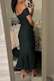 I ordered this dress originally because I thought the material was like a thick, shiny, body-con material but perhaps I should have read the description and reviews closer. The material is definitely just a traditional stretchy, thicker cotton-like material, similar to many of Lulu's form fitted dresses. However, it is not as thick as some of the Lulu's body-con dresses I already own. I got my usual size of XS and unfortunately it is a little big. I wanted it to be tighter in the hips and waist to accentuate my shape more. There is no zipper though, so being tighter would likely cause a problem with pulling the dress on over my hips/butt, which already is a bit of a struggle. The style itself is beautiful, and in the end I decided to keep it as I love the color and think the dress is quite flattering overall, just disappointed in the material and sizing. - Stephanie S.