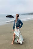 The dress arrived and I immediately noticed the quality was much better than expected. Gorgeous fabric and print colors. It was long but I am only 5'3" so I had it hemmed. Very happy with the purchase and I would recommend it. - Charlotte M.