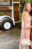 This dress fit me so so well!! I wore it to my friend's garden wedding and it fit the vibe perfectly. It's extremely flattering - it was a little hard to tie because there are so many strings and you need to adjust it so you don't have a ton of cleavage- but if you've got ladies around you who are willing to help you'll be all set!! The color is great and the pattern was super cute. Pair with a cute nude heel and you'll be good to go! The length was great too. - Sophia L.