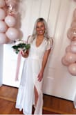 I bought this dress for my bridal shower and absolutely loved it! It was so flattering around my waist and was very comfortable. Also, it has a side zipper which I love! - Lauren T.