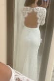 This dress fits like a glove without being restricting. The lace is so soft! It's the perfect, classic gown for my vow renewal! - Amy G.