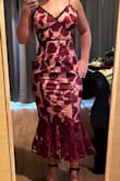 I was excited to try on this dress as I have an hourglass shape, but the fit wasn't right and the fabric was very itchy inside. I was not wearing any shapewear or bra so maybe that would have fixed the feel, but the top is baggy on the sides while the hip area was very tight. I wanted to be more comfortable at the event so I ended up with another dress. The medium fit better on the hips but was way too big on the top. - Lindsay W.