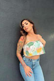 I love this top because of the print and I'm a fan of crops. The top is double layered so that is a nice touch if you wanted to go without a bra but with pasties, you could (can't relate). The only thing is you will have to adjust the top because it does ride up but it's still cute and I would buy it again! I paired it with high-waisted jeans for my birthday >s 34 and feel stylish and confident! - Mandi H.