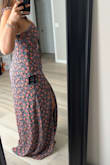 Love this dress as it's very different from what I usually go for. I ordered it in a small and a medium. The small is VERY tight across my bust and back (34D), but the medium was just too loose everywhere to keep. The fabric doesn't have any stretch to it, but I'm hoping it will give a little bit as I like this dress too much to return it. You can see in the second photo how it makes my boobs look like pancakes. I really wish there was a size that catered to hourglass figures because I'm beginning to think this body type is a curse! - Alaina Q.