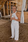 I absolutely loved this jumpsuit. I ended up wearing it for my wedding reception and I got so many compliments on it. The only bad thing I can say about it is that it runs long, but I am also 5'1 and most things are long on me. I ended up having to get it hemmed up because it was so long. Overall beautiful jumpsuit and I was so happy with it. - Marque R.