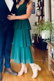 This dress was everything I needed for a formal wedding. It was a great length - hit about mid-shin. The waist was very flattering with the wider skirt. There is a hidden zipper up the side. I was able to wear a low sticky bra underneath the top to keep the girls in place. Very comfortable, true to size, and got a lot of compliments - Kristen W.
