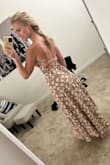 This dress looked flattering on me even though it's a maxi and I am not on the tall side. Sometimes I get lost in longer dresses but this was just right. Loved the print and base tan color too! I'll get many wears out of it! I wore it to a bridal shower. Love love love! - Danielle R.