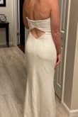 Great quality, heavy material, not the best for my specific body shape (wide waist small bust) but great dress! LOVE the back. - Lisa B.