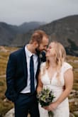 I bought this dress for my wedding and loved it! We had a wedding at a national park and this felt like a good mix of not-too-fancy but still bridal while having a little of my style infused into it (granola/outdoorsy). I got lots of compliments on it! I am ~145lb, 5'3, and 36B/C with wide hips and a tummy. I am usually a small or medium depending on the brand (realizing I am a medium at Lulus after several purchases); I tried a small and a medium. The medium fit well but was tight, but not enough to exchange. I figured that's the style. I felt like going up a size would have been too big in the chest area for me. I wasn't able to wear a bra with it, but I didn't really need it. I imagine a sticky bra or tape would have worked. At 5'3, I wore 3-ish inch block heels with it and it just barely touched the ground. - Kristen A.