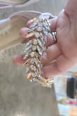I bought these for a wedding. My dress was long since it was formal attire. The crystals kept on getting stuck to my dress and would fall off when removing the fabric from it. I had them on for maybe 2 hours before changing into a different pair. - Amber B.