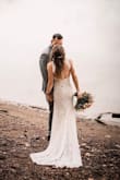 Nobody believed me when I told them it was $119. Fit like a glove- had my tailor add a bustle and a decorative belt for some bling, as well as sew-in cups. Stunning dress. Only cropped the first photo because the train needed to be shown in full display! - Aleigh H.