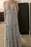 This dress is cute and comfy. Runs a tad big, so if in between I would size down. - Mallory L.