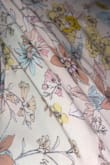 It fit very well, the fabric feels heavy and of good quality, and I think the pastel colors are beautiful. At first, I thought my chest would show too much but I just had to adjust the straps in the back. Plus, it has pockets. - Michelle E.