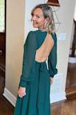 Loved this dress!! It fit great and I got so many compliments! Beautiful fall color and was actually super comfortable - once everything was tapped securely in place!! One bit of advise - bring a safety pin - my button broke at the end of the night, but love the dress so much I will have it fixed! - Brooke P.