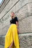 This is my sweat favorite go-to skirt! Even with sneakers, it makes me feel classy. The material is light but not see-through. Wrinkles easily- but doesn't look terrible with some wrinkles- unlike some materials. Lovely addition to my closet! - Ryahjoy L.
