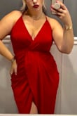 I got this dress in red and loved it so much I got it in black. I'm trying to find places to go so I can buy another color to wear. It's stretchy and comfortable and hides my insecurities in the stomach area. Absolutely beautiful! - Kristin O.