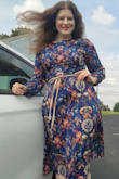 I got so many compliments on this dress! I loved the colors and the material. If you're blessed in the chest area, this probably is not the dress for you. Through the chest/shoulders, the dress was a little bit snug, yet the waist had a lot of "flow". I felt like I lost sight of my curves so I paired it with a string belt I had in my closet. Over a great win! I definitely can see myself wearing it again to work in a professional setting. - Rachael M.
