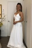 I fell in love with this gown the moment I saw it on the site. This gown looks like a thousand bucks and my friends was all shocked to find out how much I paid for this. This is so beautiful, classy and elegant. Can't wait to wear this on my destination wedding. It's a little big on me though and really long, needs to bring this to be altered. I ordered XS but I still find it a bit big. I probably should had order XXS - Audi L.