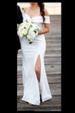 Wore it to my wedding reception and everyone loved it! I had it altered a tiny bit though... I raised the waistline to be more in line with my body shape and cut off a few inches from the bottom! The sleeves were a little restricting but that's expected for an off-shoulder dress. Overall a simple yet elegant dress for the occasion! - Mayra K.