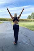 I wore this jumpsuit to a wedding & got so many compliments! It's incredibly flattering. Comfortable. I did size down according to the other reviews I read & it was correct. I normally wear a small & order an XS and it fit perfectly! - Makayla F.
