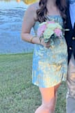 This dress is so fun! The gif finder suggested a small and it was spot on. It's a beautiful dress and fabric is light so made it comfortable and not too hot to wear at the dance. Dress is gorgeous. Received so many compliments and was different from anything anyone else had! So happy with this purchase. - Denise N.