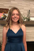 Loved this dress on my daughter. She has very long legs and this was not too short and she really like the flare of the skirt when she twirled. Fit was nice and modest and we didn't worry that she might show too much cleavage or have straps falling down because they crisscrossed in the back. Very pretty color as well. - Amy O.